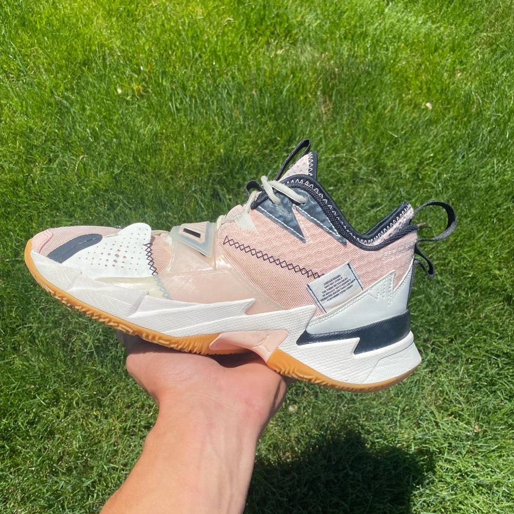 Nike Jordan Why Not Zero Basketball Shoe. Pink Tint Ivory
